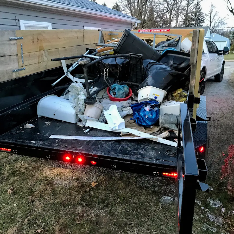 Roll-off dumpster delivered to a residential driveway in Bel Air