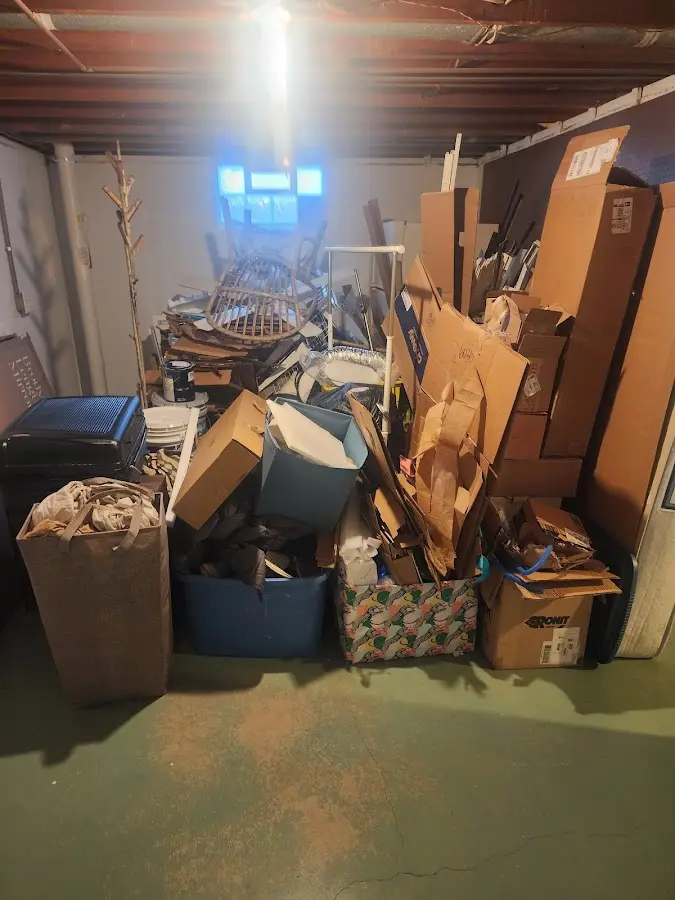 Roll-off dumpster container at job site for Construction Dumpster Rental in Bel Air